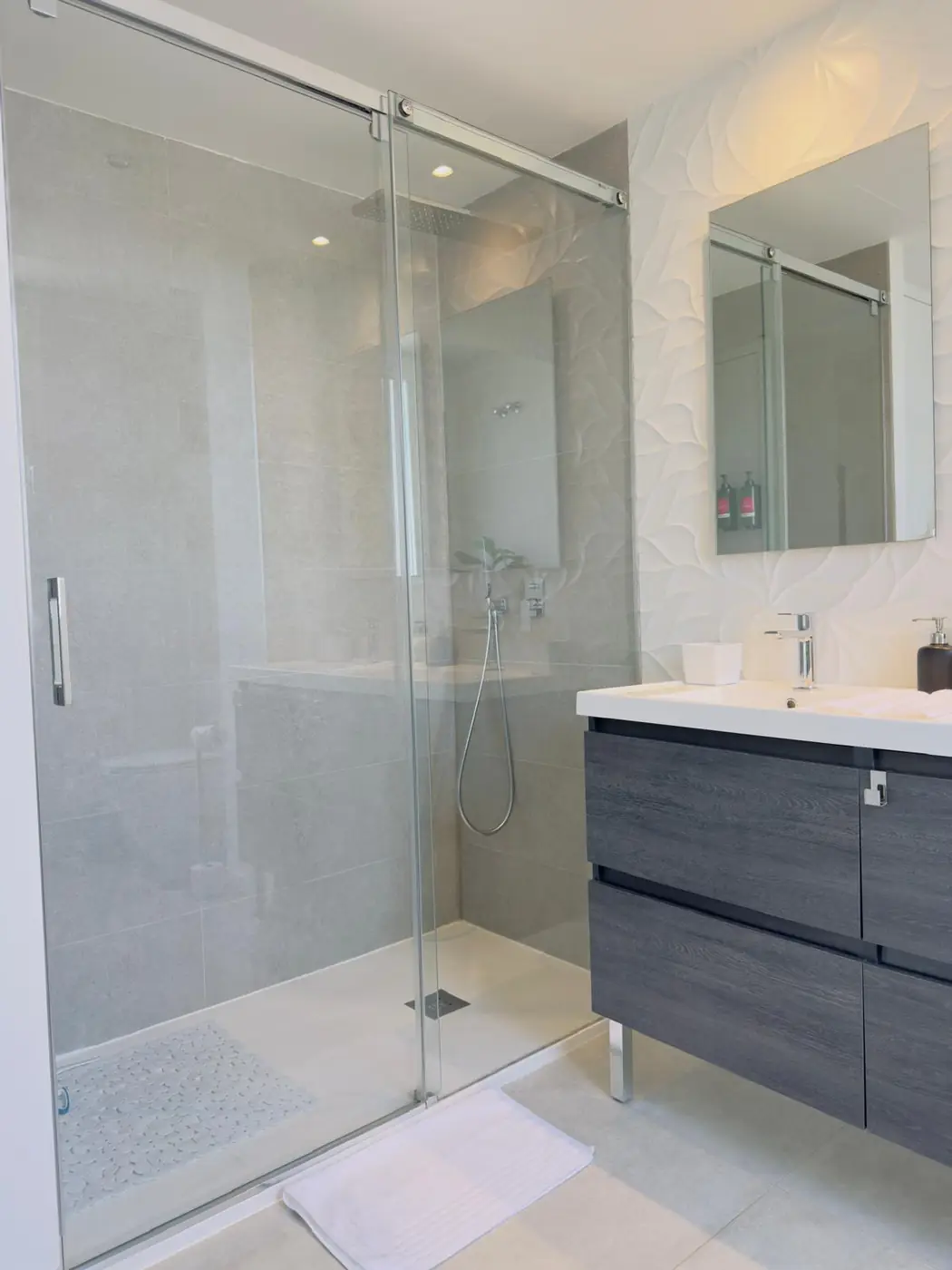 Bright bathroom with a glass shower